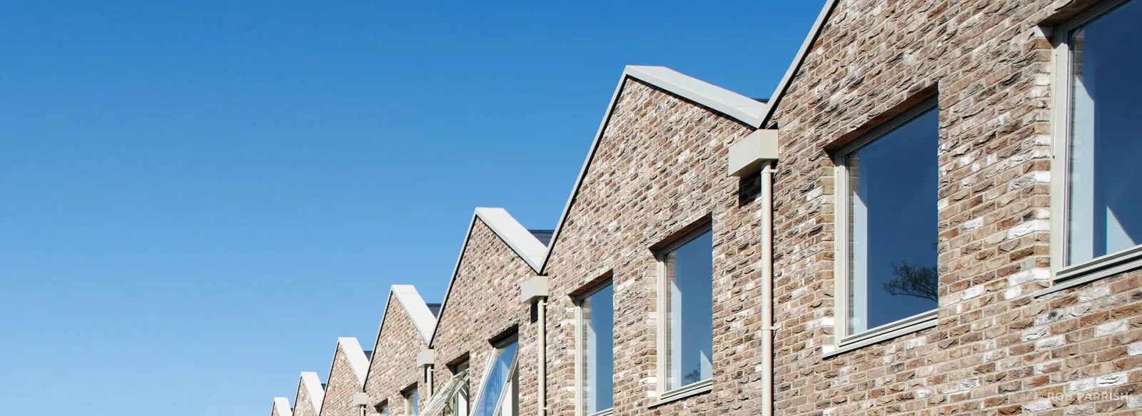 Aluminium copings for award winning social housing development. William Street Quarter
