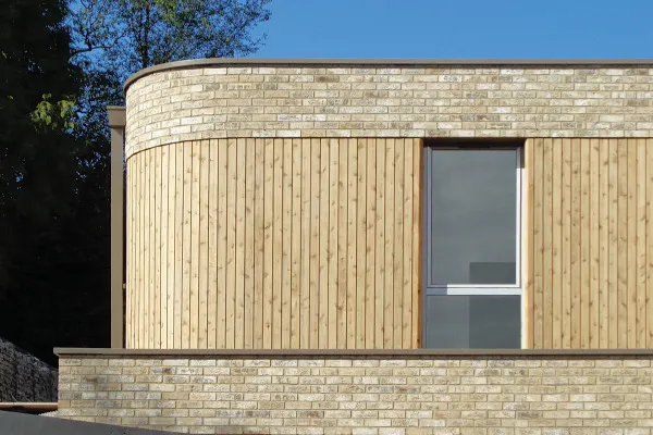 Curved radius coping roof and wall